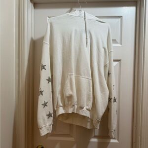 White LF Hoodie with Star Accents on sleeve. Have tried on but never worn out